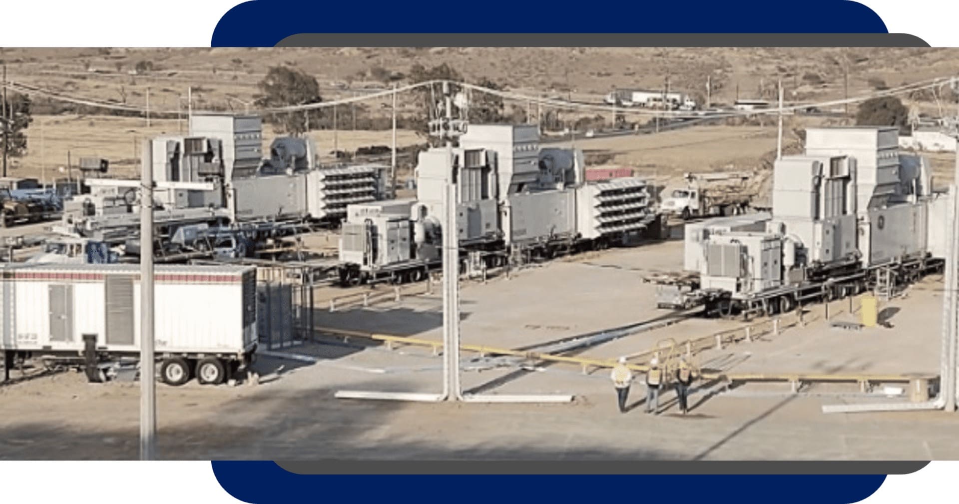 A large truck yard with many trucks parked in it.